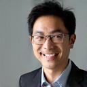 Professional headshot of Kenji Sato